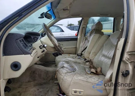 2000 Lincoln Town Car Executive z USA, uszkodzony, nr VIN 1L1FM81W9YY804792